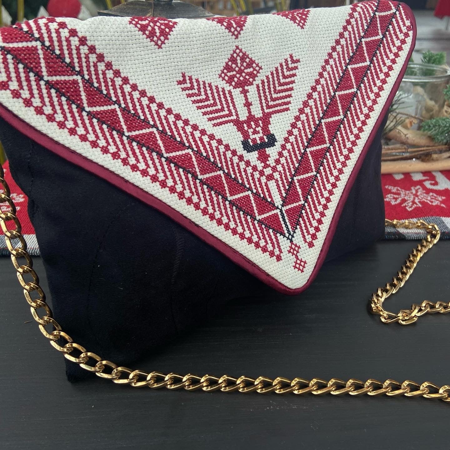 Traditional hand embroidered black velvet clutch , from Nabila’s Creations