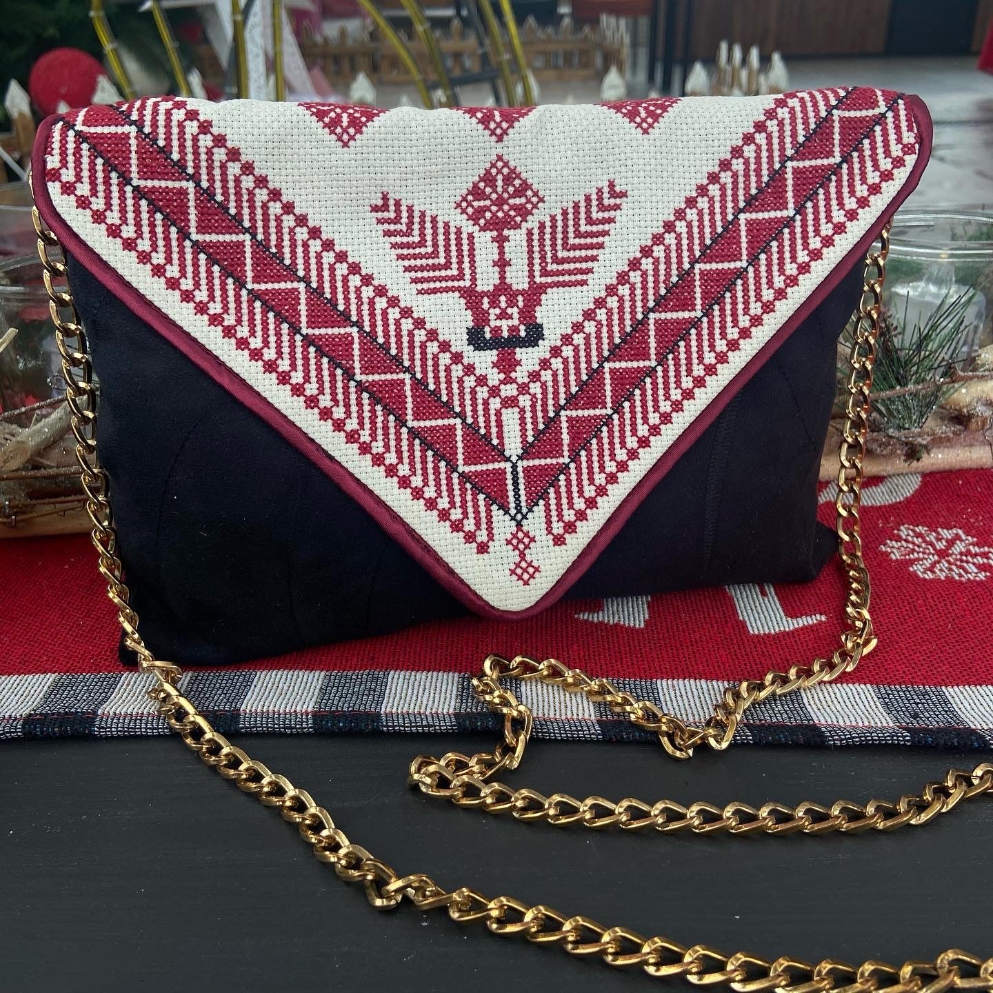 Traditional hand embroidered black velvet clutch , from Nabila’s Creations