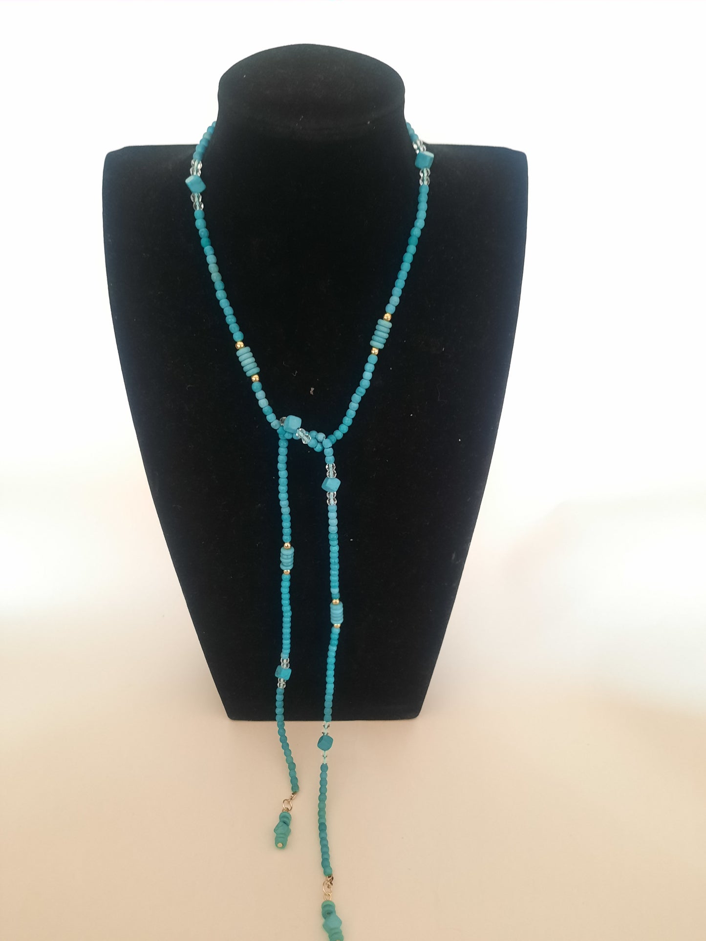 Gold plated tall trousers stones necklace