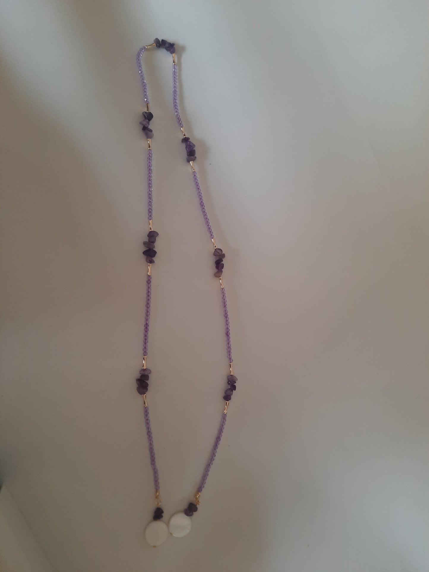 Gold plated tall necklace with amatist stones and shell