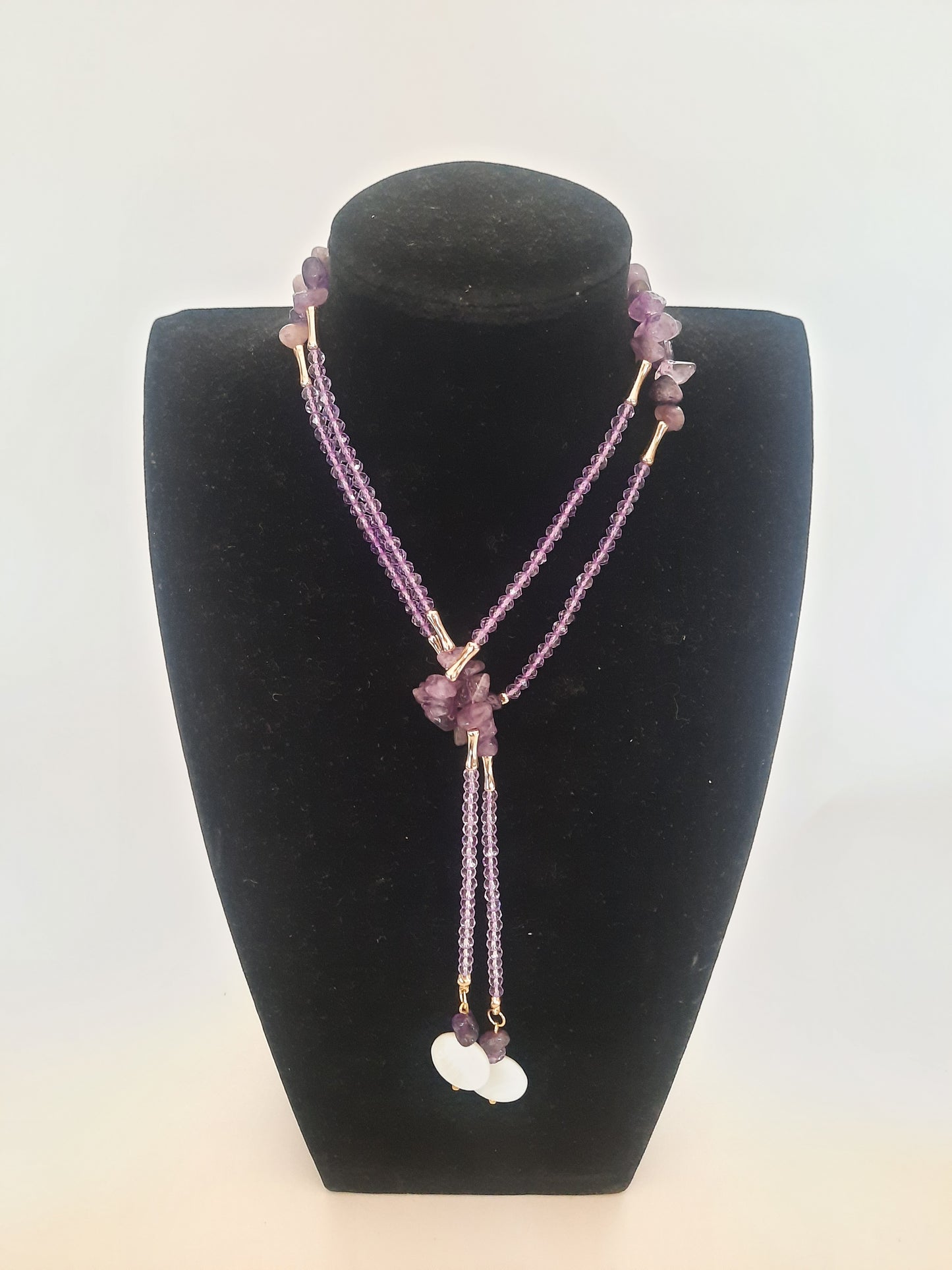 Gold plated tall necklace with amatist stones and shell